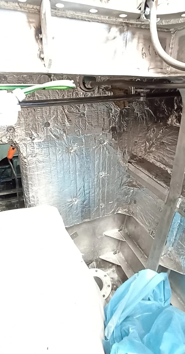 Renewed aluminium-faced sound and heat insulation lining in a boat engine room