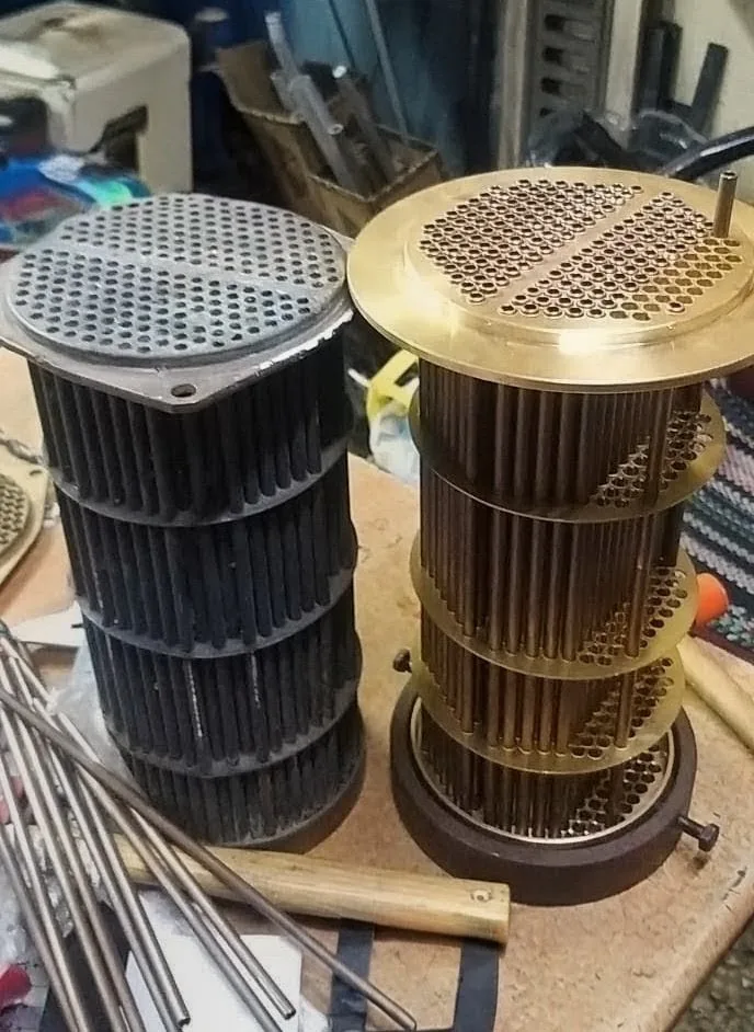 Retubed heat exchanger tube bundle next to the old, clogged tube bundle